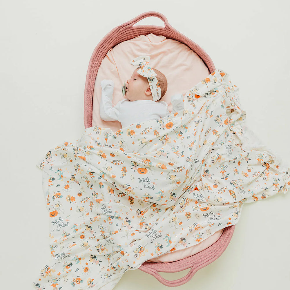 
                      
                        Copper Pearl Swaddle | Mickey Mouse's Boo Bash
                      
                    