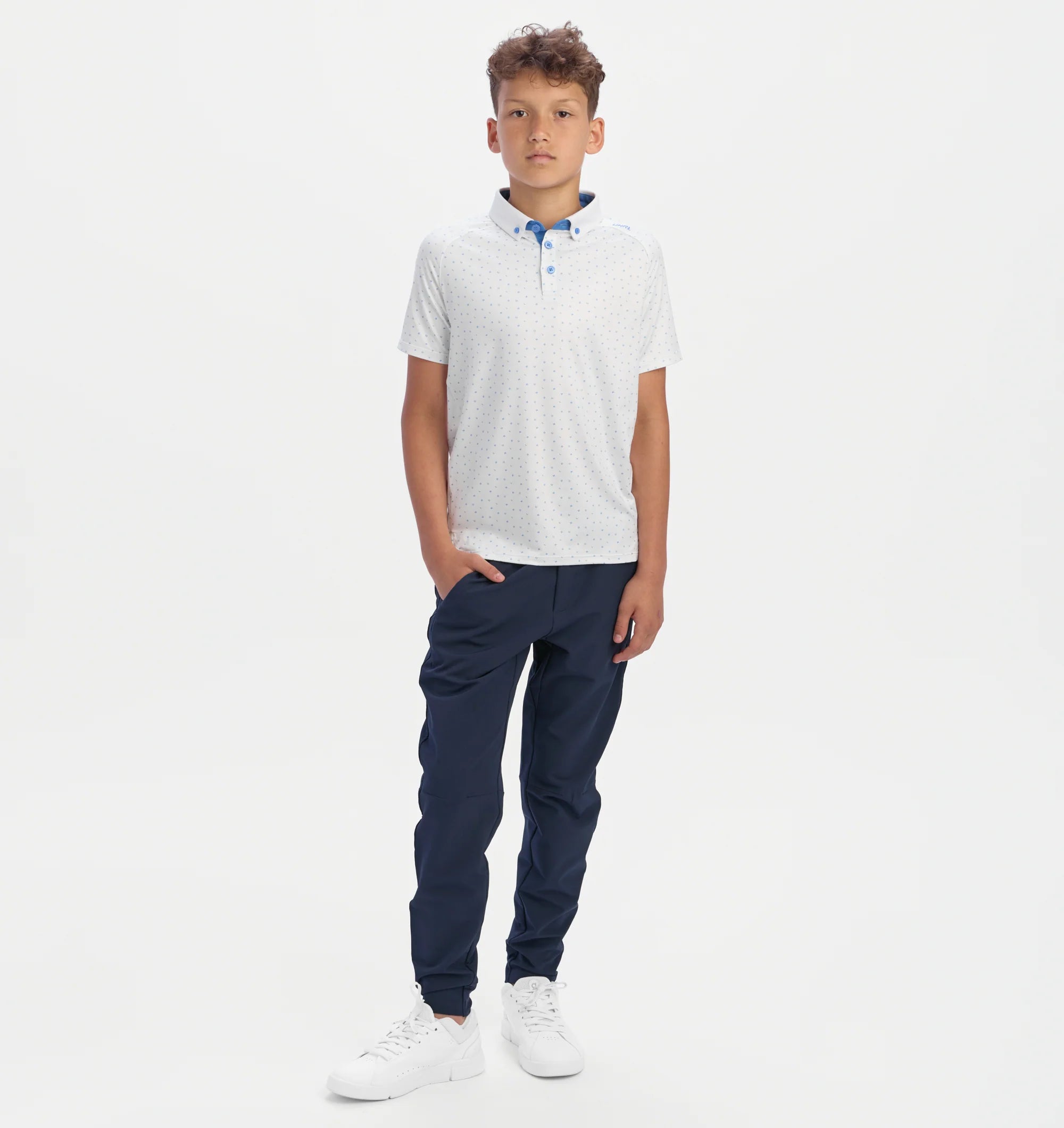 Youth UNRL Scramble Polo | White/Blue