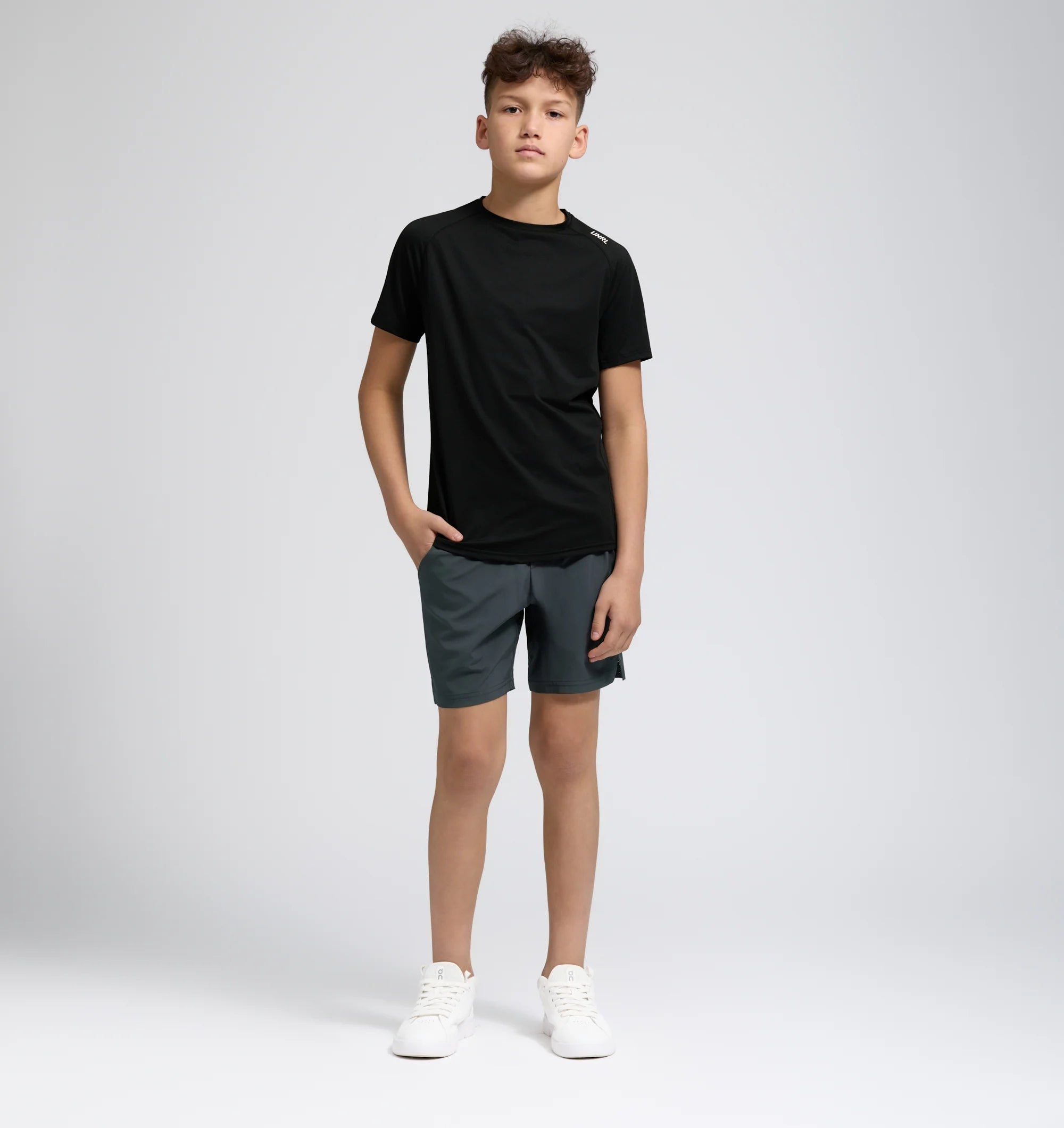 Youth UNRL Stride Short 7.5" | Asphalt