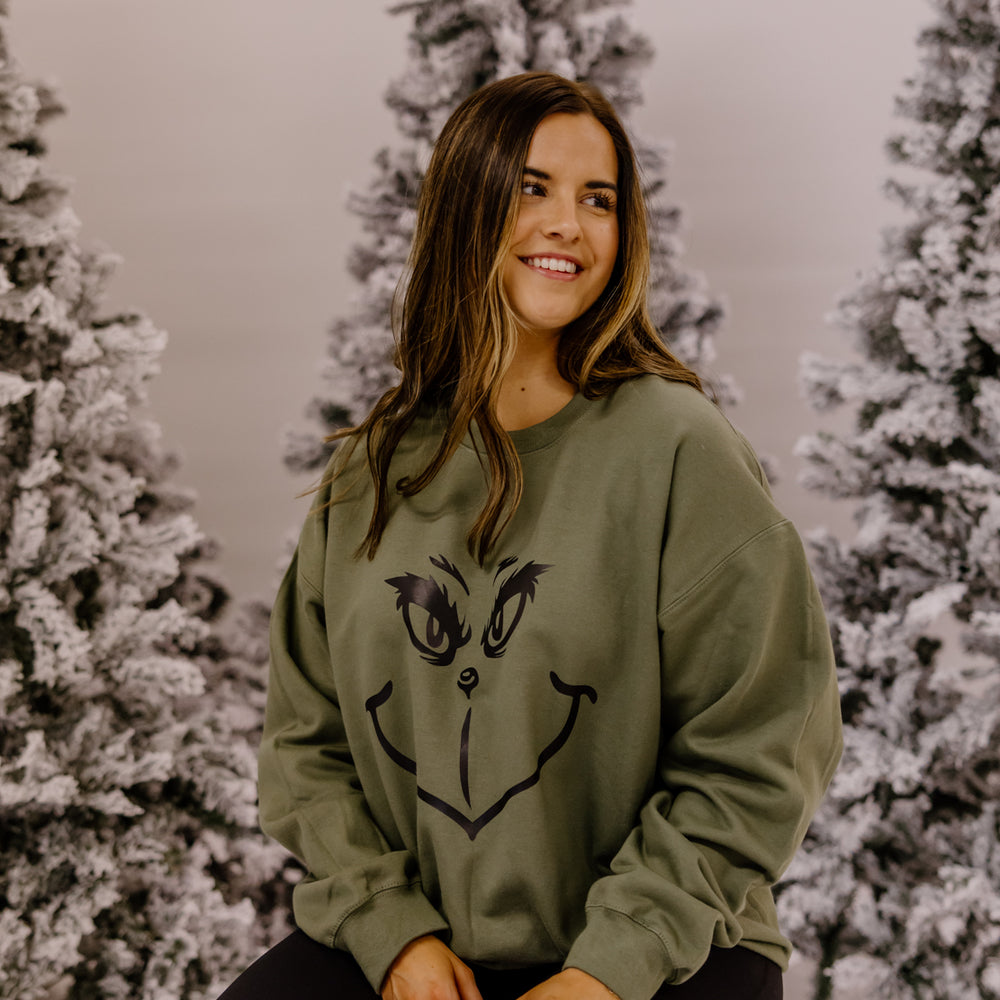 
                      
                        Grinch Christmas Crewneck | Military Green
                      
                    