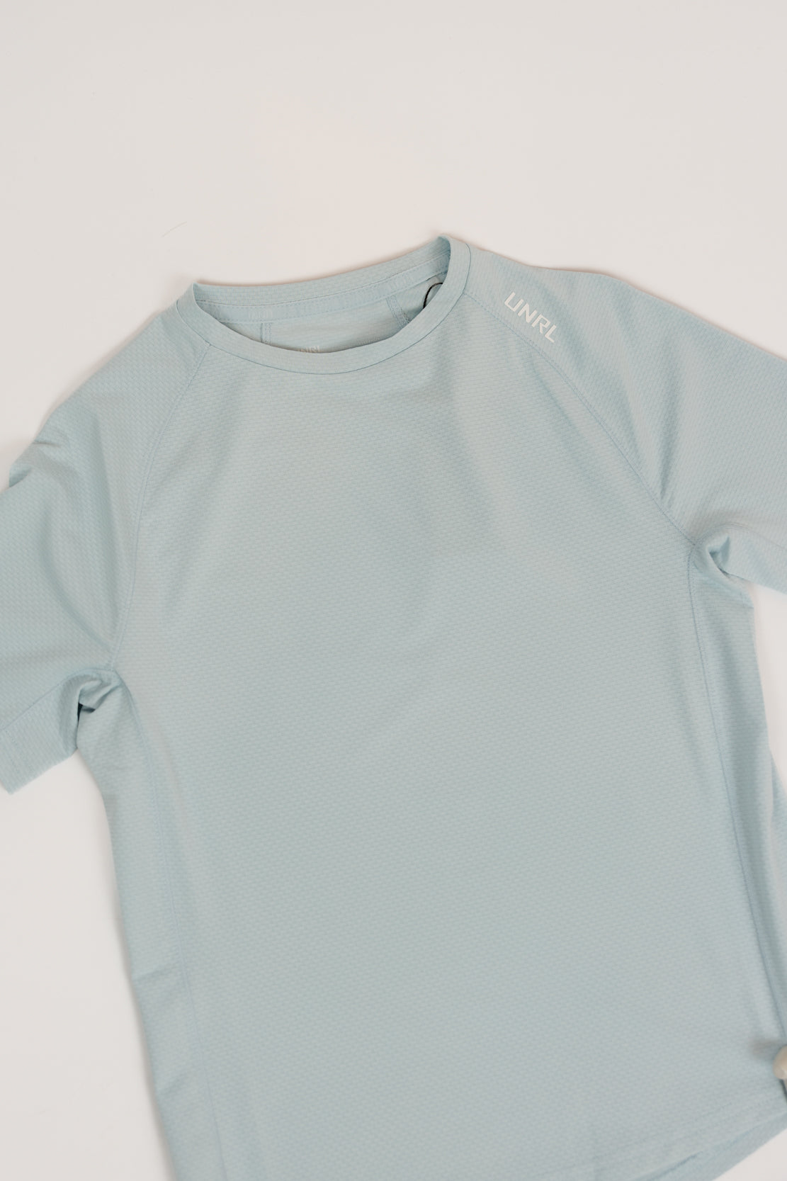 Youth UNRL Streamline Performance Tee | Cascade Blue