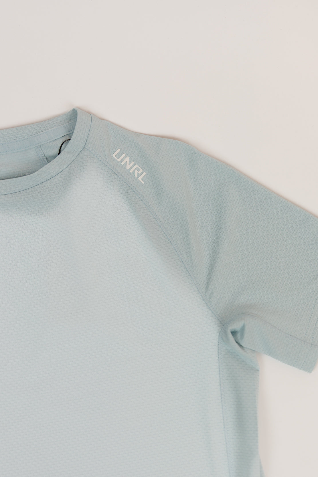 Youth UNRL Streamline Performance Tee | Cascade Blue